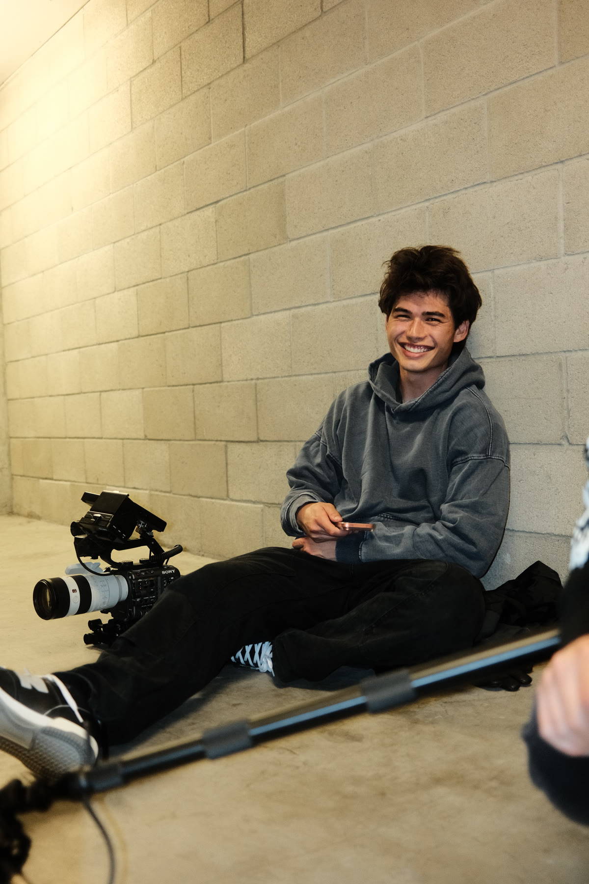 Raphael Dael on set, sitting beside his camera rig